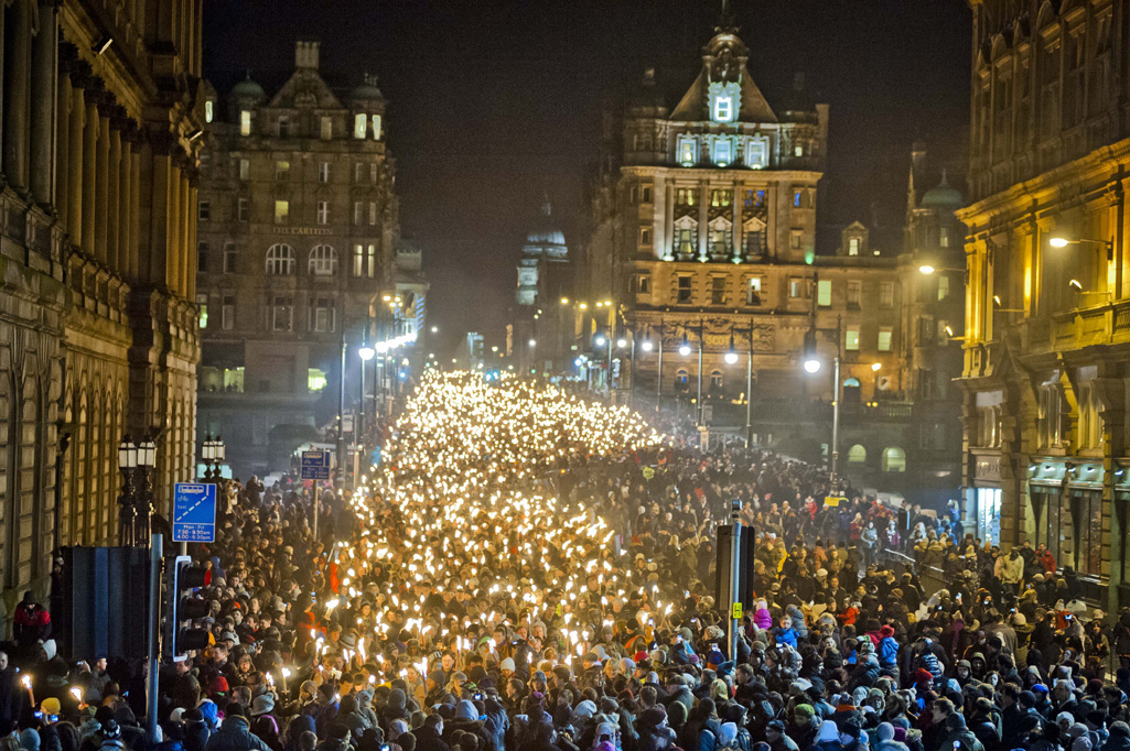 Edinburgh's Hogmanay Torchlight Procession crosses North Bridge